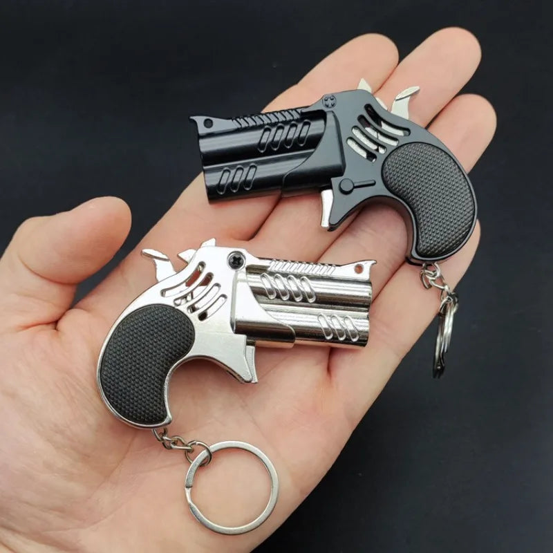 EZ 1Pcs Mini Keychain Metal Rubber Band Gun Game Toy Gun Launcher Children's Simulation Pistol Toys Gifts Pendent