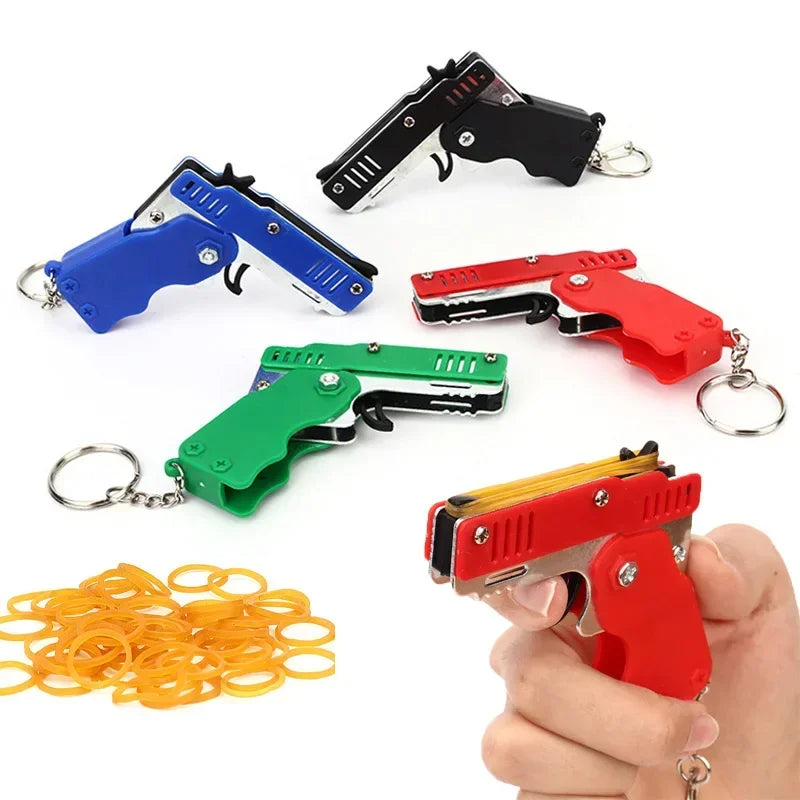 EZ 1PC Mini Keychain Gun Rubber Band Gun Toy Gun Shooting Pistol Alloy Kid Outdoor Activities Party Game Birthday Gift for Children