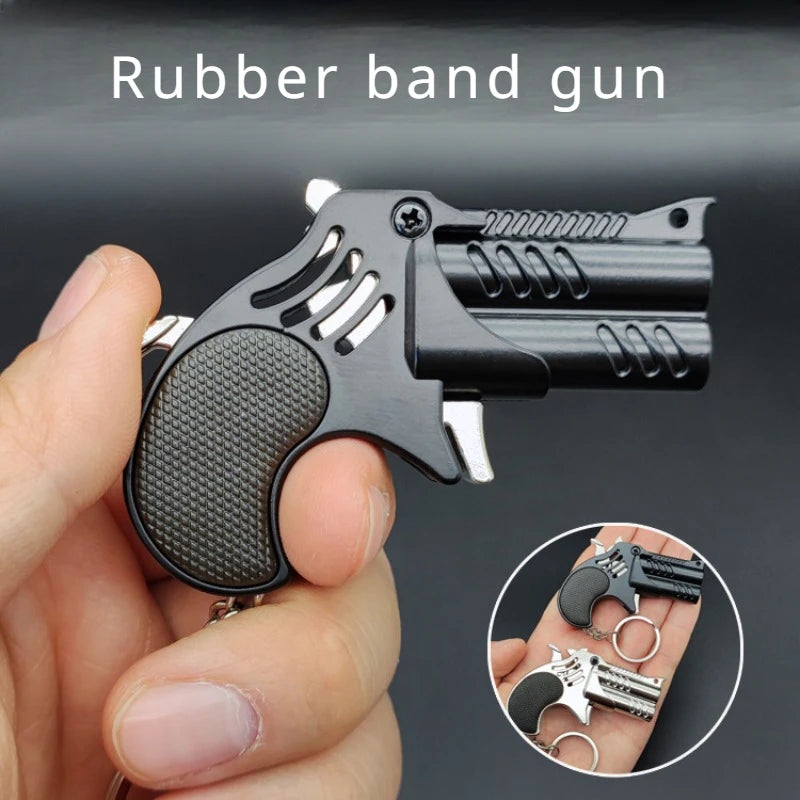 EZ 1Pcs Mini Keychain Metal Rubber Band Gun Game Toy Gun Launcher Children's Simulation Pistol Toys Gifts Pendent