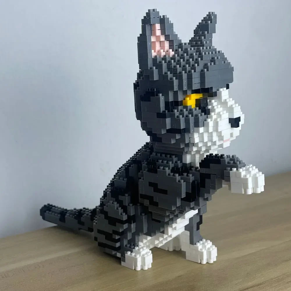 EZ Knew Built Four styles of expressive micro particle mini cat building blocks, orange and cow models, favored by pet enthusiasts